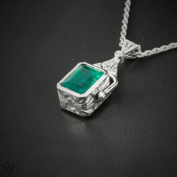 White Gold Onyx and Emerald Pendant